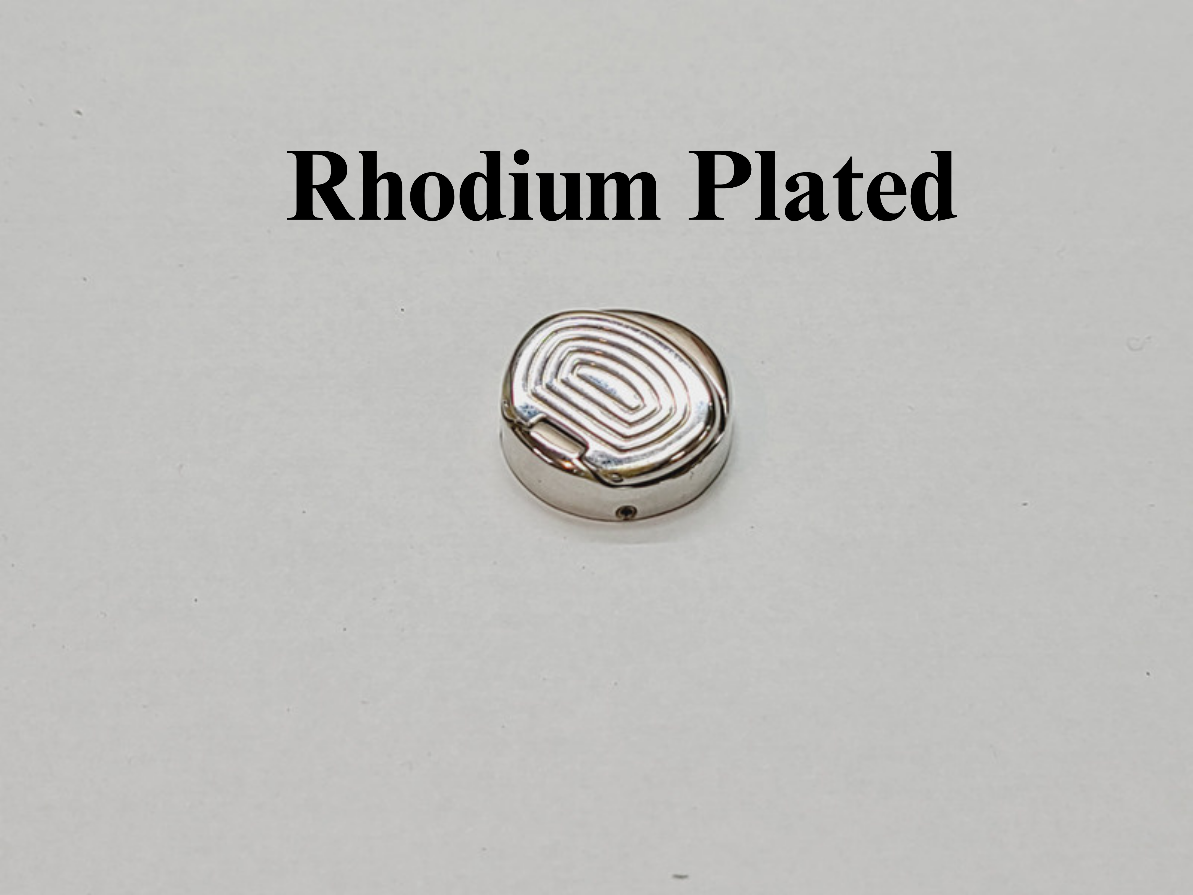 Rhodium Thumb Rest